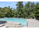 Inviting community pool with plenty of lounge chairs at 456 Sycamore Shade St, Charleston, SC 29414