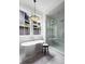 Spa-like bathroom with a soaking tub, walk-in shower, and marble flooring at 507 Mccants Dr, Mount Pleasant, SC 29464