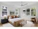 Spacious bedroom with large windows, a king-size bed, and plenty of natural light at 507 Mccants Dr, Mount Pleasant, SC 29464