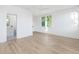 Light-filled bedroom with hardwood floors and access to a private bathroom at 507 Mccants Dr, Mount Pleasant, SC 29464