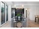 Dining area with round glass table and gray velvet chairs at 507 Mccants Dr, Mount Pleasant, SC 29464
