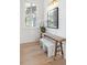 Entryway features hardwood floors and a rustic wood bench at 507 Mccants Dr, Mount Pleasant, SC 29464