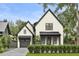 Two-story white brick home with dark gray accents at 507 Mccants Dr, Mount Pleasant, SC 29464