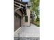 Brick home with a dark gray garage door and a paved walkway at 507 Mccants Dr, Mount Pleasant, SC 29464