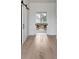 Light-filled hallway with access to other rooms at 507 Mccants Dr, Mount Pleasant, SC 29464