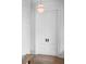Bright hallway with white paneled walls and hardwood floors at 507 Mccants Dr, Mount Pleasant, SC 29464
