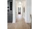 Bright hallway with hardwood floors and a view to the front door at 507 Mccants Dr, Mount Pleasant, SC 29464