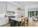 Modern kitchen with marble island and high-end appliances at 507 Mccants Dr, Mount Pleasant, SC 29464