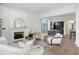 Open living room with hardwood floors, fireplace, and comfortable seating at 507 Mccants Dr, Mount Pleasant, SC 29464