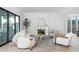 Living room with fireplace, seating, and access to backyard at 507 Mccants Dr, Mount Pleasant, SC 29464