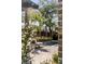 Relaxing pool view with lounge chairs and palm trees at 507 Mccants Dr, Mount Pleasant, SC 29464
