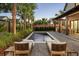Long, rectangular pool with lounge chairs and landscaping at 507 Mccants Dr, Mount Pleasant, SC 29464