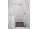 Clean and spacious walk-in shower with hexagon floor tile at 507 Mccants Dr, Mount Pleasant, SC 29464