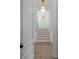 Bright stairwell with light wood floors and modern lighting at 507 Mccants Dr, Mount Pleasant, SC 29464