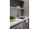 Wet bar with marble countertops and a sleek gold faucet at 507 Mccants Dr, Mount Pleasant, SC 29464