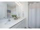 Bathroom with double vanity, large mirror, and shower at 553 Trotters Ln, Moncks Corner, SC 29461