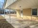 Covered carport with access to the house and backyard at 7640 Hillview Ln, North Charleston, SC 29420