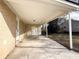 Covered patio with concrete flooring and access to backyard at 7640 Hillview Ln, North Charleston, SC 29420