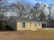 Newly renovated brick ranch house with carport and landscaping at 7640 Hillview Ln, North Charleston, SC 29420