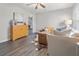 Bright living room with hardwood floors and open concept to kitchen at 7640 Hillview Ln, North Charleston, SC 29420