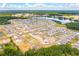 Aerial view of large neighborhood with many houses at 780 Opal Wing St, Moncks Corner, SC 29461