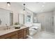 Spa-like bathroom with double vanity and walk-in shower at 780 Opal Wing St, Moncks Corner, SC 29461