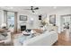 Spacious living room with hardwood floors, fireplace, and comfy seating at 780 Opal Wing St, Moncks Corner, SC 29461