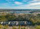 Aerial view of townhouses near a large parking lot at 8202 S Antler Dr, North Charleston, SC 29406