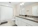Double vanity bathroom with granite countertops and a shower/tub at 8202 S Antler Dr, North Charleston, SC 29406