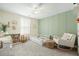 Bedroom with a crib, rocking chair, and plenty of storage at 8202 S Antler Dr, North Charleston, SC 29406