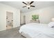 Spacious bedroom with en-suite bathroom and ceiling fan at 8202 S Antler Dr, North Charleston, SC 29406