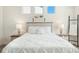 Charming bedroom featuring a bed with white bedding, and night stands at 8202 S Antler Dr, North Charleston, SC 29406