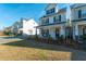 Two story home with front porch and landscaping at 8202 S Antler Dr, North Charleston, SC 29406