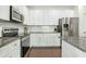 Modern kitchen with granite countertops and stainless steel appliances at 8202 S Antler Dr, North Charleston, SC 29406