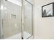 Clean shower with tile surround and glass enclosure at 8202 S Antler Dr, North Charleston, SC 29406