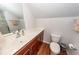 Bathroom with toilet, sink, and shower at 826 Rue Dr, Charleston, SC 29414