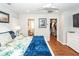 Main bedroom with large bed, ensuite bathroom access, and walk-in closet at 826 Rue Dr, Charleston, SC 29414