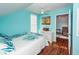 Bright bedroom with a double bed and bonus room access at 826 Rue Dr, Charleston, SC 29414