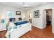 Main bedroom with white bed frame, ensuite bathroom, and walk-in closet at 826 Rue Dr, Charleston, SC 29414