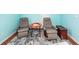 Bonus room with two recliners and a small table at 826 Rue Dr, Charleston, SC 29414