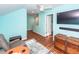 Bonus room with a recliner, chest, and hallway access at 826 Rue Dr, Charleston, SC 29414