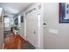 Bright entryway with hardwood floors and view of living room at 826 Rue Dr, Charleston, SC 29414