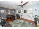 Spacious living room with hardwood floors, ceiling fan, and comfortable furniture at 826 Rue Dr, Charleston, SC 29414
