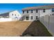 Large backyard with a view of neighboring houses at 9761 Transplanter Cir, Ladson, SC 29456