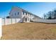 Private backyard with a white vinyl fence at 9761 Transplanter Cir, Ladson, SC 29456
