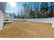 Fenced backyard with grassy area and patio at 9761 Transplanter Cir, Ladson, SC 29456