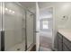 Walk-in shower with glass enclosure in main bathroom at 9761 Transplanter Cir, Ladson, SC 29456