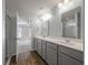 Bathroom boasts double vanity and a shower, and has access to bedroom at 9761 Transplanter Cir, Ladson, SC 29456