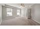 Spacious bedroom with carpeted floor and natural light at 9761 Transplanter Cir, Ladson, SC 29456
