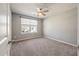 Bright bedroom featuring carpeted floor and a ceiling fan at 9761 Transplanter Cir, Ladson, SC 29456